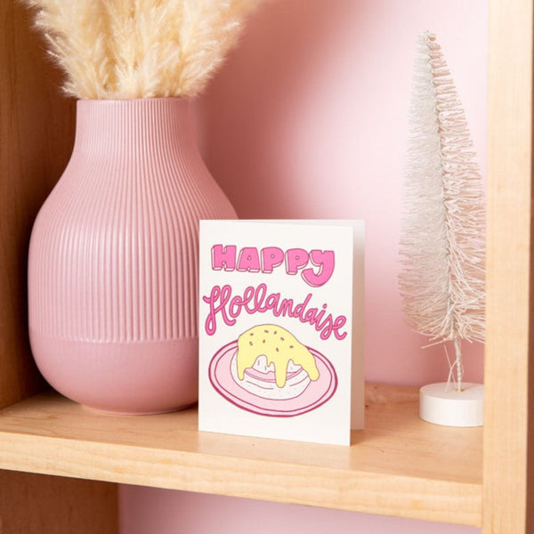 White, pink, and yellow "Happy Hollandaise" greeting card.
