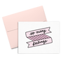 So Many Feelings is a cute greeting card with a pink banner and black script lettering.