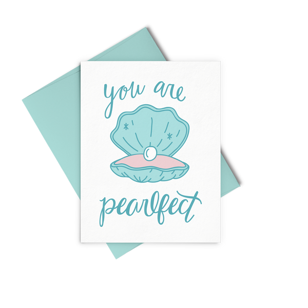 You Are Pearlfect is a cute greeting card with a blue clam shell, hand lettering, and a blue envelope.