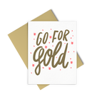 Go For Gold encouraging greeting card with gold and coral design and a gold envelope.