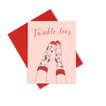 a greeting card saying 'Twinkle toes' in red cursive; a drawing of someone wearing christmas socks covered in christmas trees and candy canes.