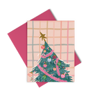 A pink holiday greeting card with a slanted Christmas tree in pink decorations and "fuck it" ornaments