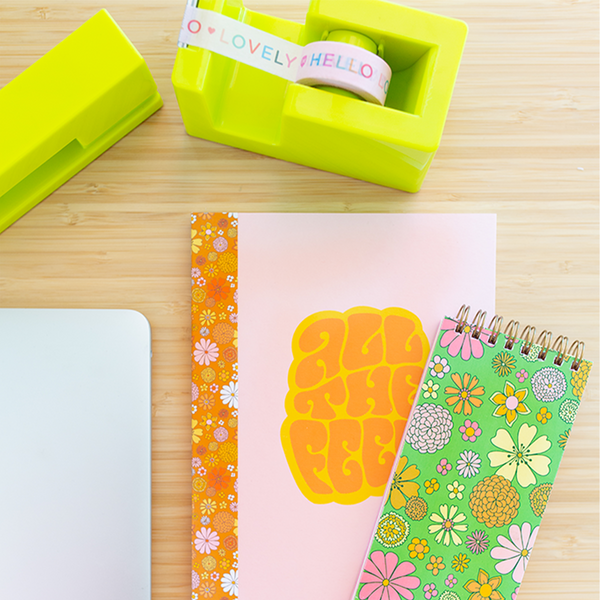 citron stapler and tape holder with some fun notebooks and taskpads