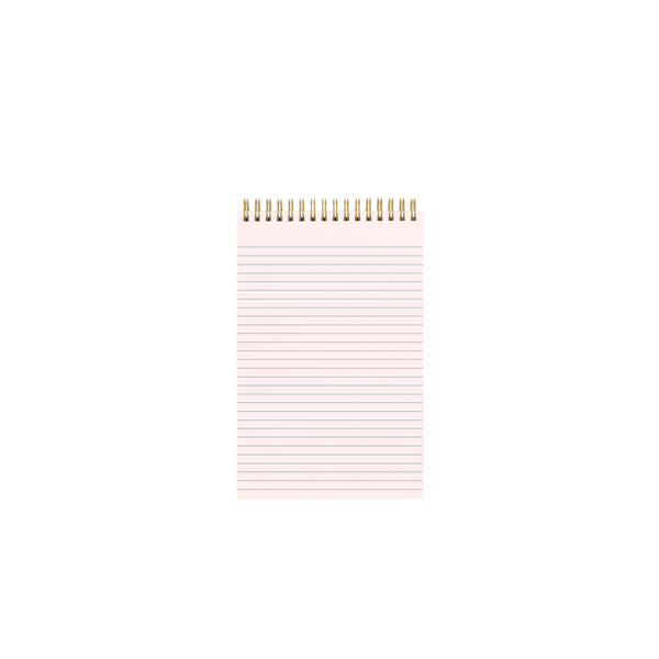 Inside pink page of a gold wire-bound taskpad showing a lined page design