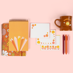 Floral notebook with fun happy taskpad with some floral stationery cards, jotters and a diner mug with a sunshine saying "fuck it'