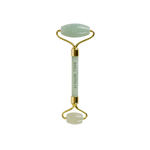 Jade and gold stone roller that says roll with it on the handle