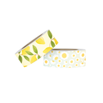 Two rolls of washi tape. The first is yellow with lemons and greenery. The second is an ombre background with white and yellow daisies. 
