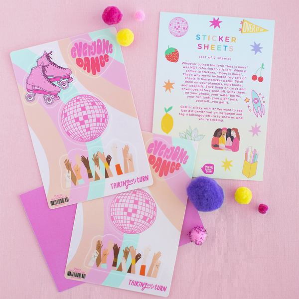 Two "Disco" sticker sets with a pink disco ball sticker, a roller skates sticker, a heart shape "Everyone dance" sticker, and a sticker where people are throwing their hands in the air. Displayed with small pom poms in front of pink background.