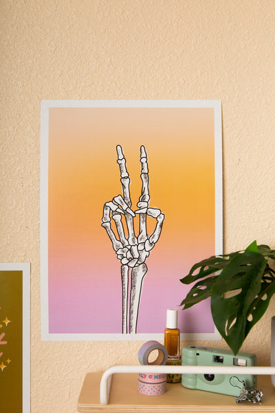 ombre coral pink to purple 12x16 poster with skeleton peace sign in the middle.