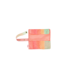 Small TOOTsie roll travel pouch open with solid peach interior and gradient colored pockets