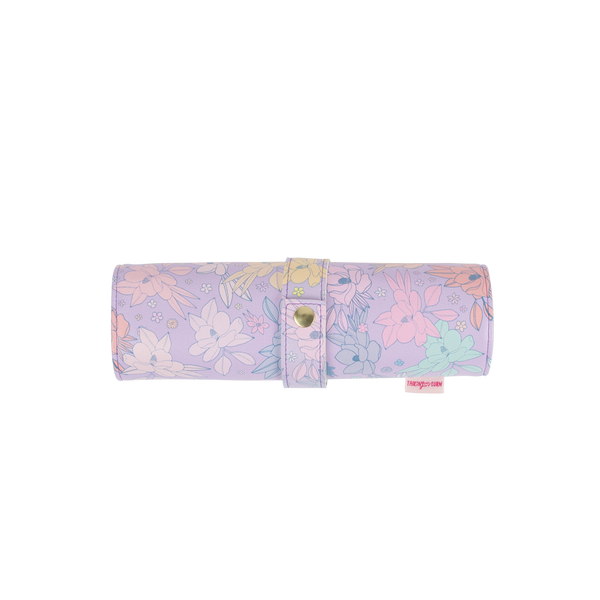 Pastel Floral large TOOTsie Roll. Has a snap closer and is made of vegan leather.