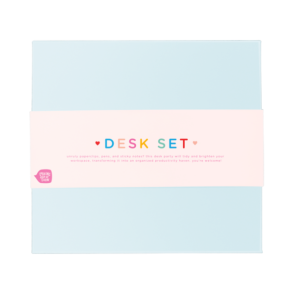 Top view of a closed powder blue box with a cute packaging band wrapped around the middle.