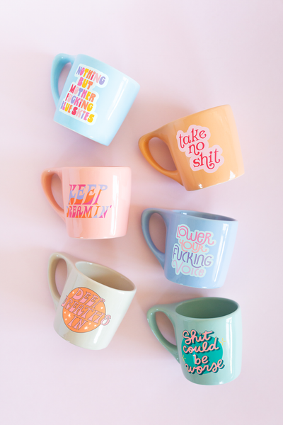 collection of coffee mugs with funny sayings 