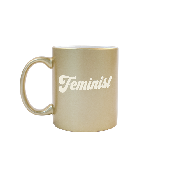 Feminist Sand Carved Metallic Mug is a funny coffee mug with engraved lettering in gold.