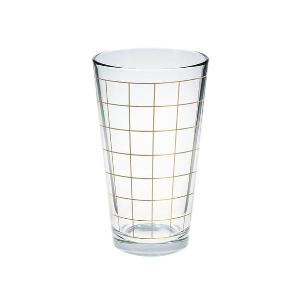 Glass pint glass with gold grid print.