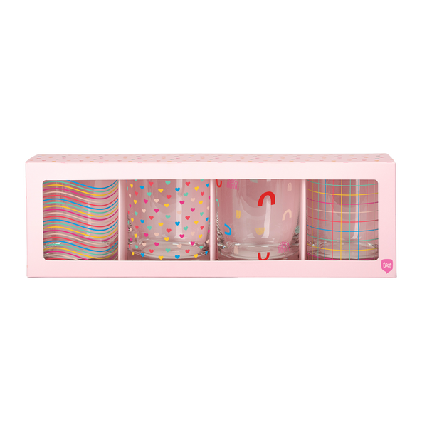 Set of 4 rocks glasses with rainbow print designs in pink box packaging.