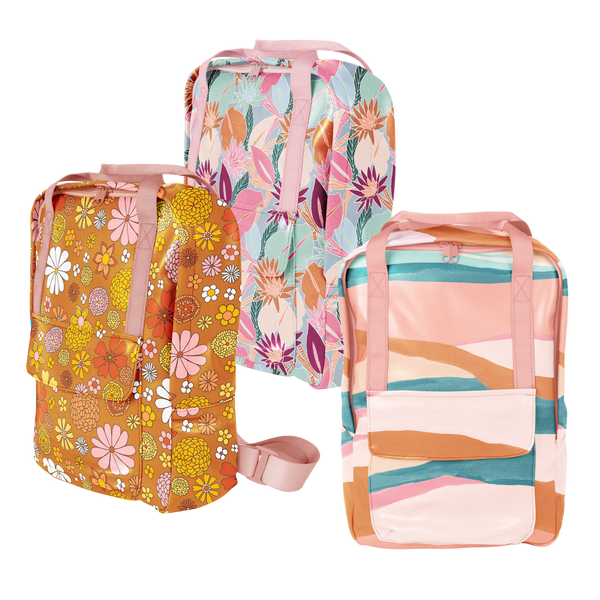 Three colorful vegan leather backpacks next to each other. one orange with floral pattern, one a floral collage, and the last with pastel stripes. 