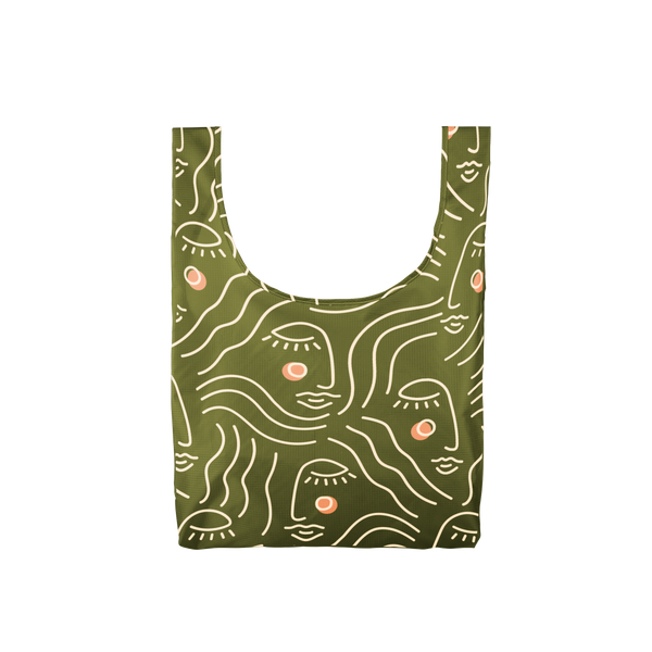 An olive green, medium sized tote bag with female faces printed on in white lines that are not connected.
