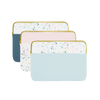 Three laptop sleeves with gold zippers; one powder blue splatter, one blush pink splatter, and one spruce green splatter.
