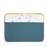 Spruce green laptop sleeve with white paint splatter trim, a gold zipper, and 15 inch size.
