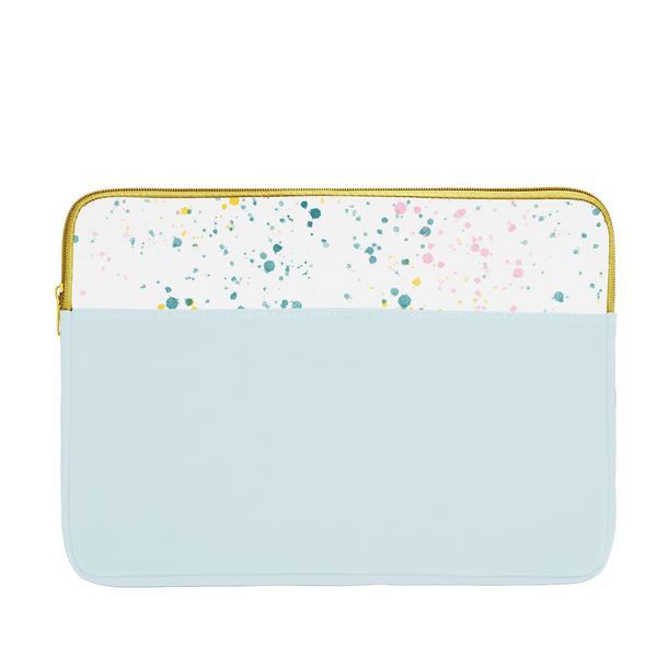 Powder blue laptop sleeve with white paint splatter trim, a gold zipper, and 15 inch size.