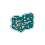 A sticker with the phrase "You've Got Whatever It is" in multicolored lettering. Background color of the sticker is blue jewel-tones.