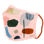 A pink facemask with paintbrush marks in nurtural and natural themed colors. 