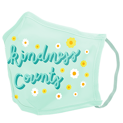 A blue facemask with small daisies. In the middle in blue cursive written "kindness counts." 