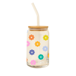 A 16 oz can glass with multi-colored daisies printed all over; wooden lid and glass straw.