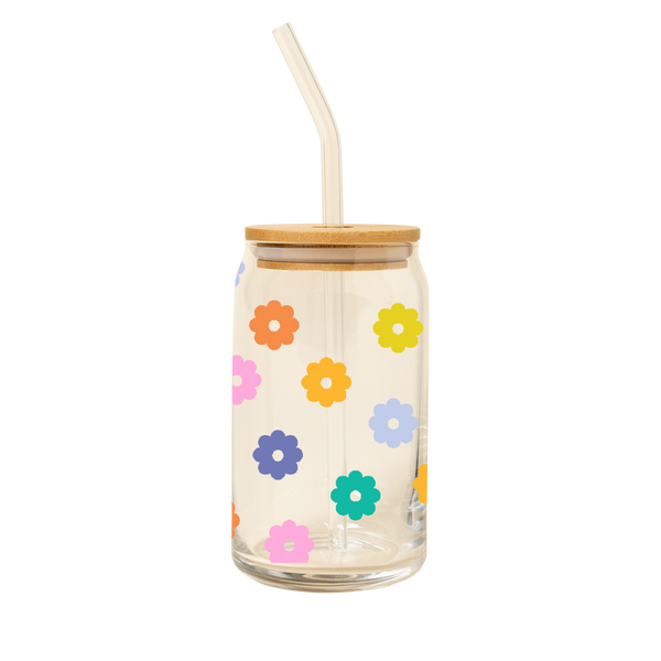 A 16 oz can glass with multi-colored daisies printed all over; wooden lid and glass straw.