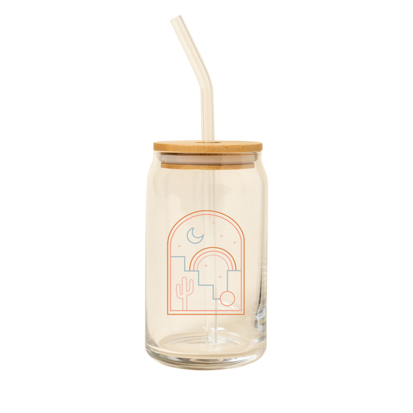 A 16 oz can glass with glass straw; "Desert Nights" illustration is printed on the front.