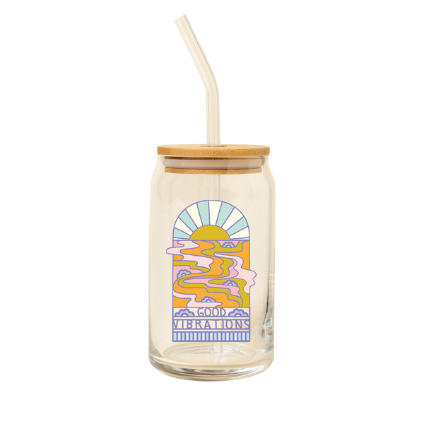 16oz can glass with glass straw and bamboo lid with the saying "good vibrations" on the front along with a multicolor graphic of a sun rise and river