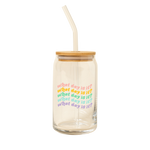 A 16 oz can glass with a glass straw; "what day is it?" is printed on and repeats 5 times, each in a different color font.