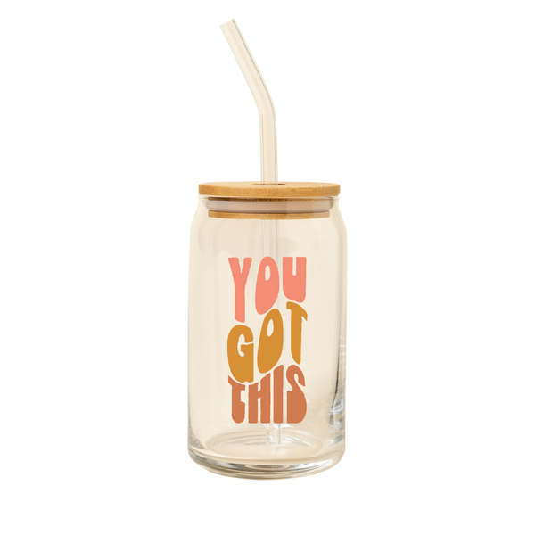 A 16 oz can glass with a glass straw. "YOU GOT THIS" is printed on the front in multi-color font.