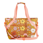 flower power ice queen image with yellow, orange, pink and white retro floral patterns.