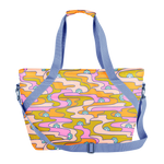 Psych Flower Ice Queen tote with blue strap. Green, pink, and orange patterns.