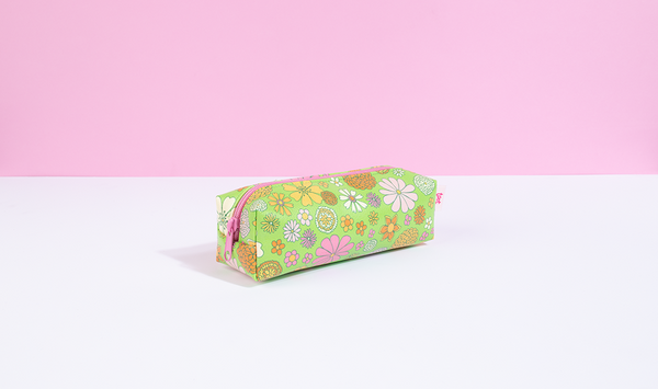 Cute small zippered cosmetics pouch with groovy green floral print.