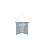 Large guidon style wall art with a blue background and Chill The Fuck Out in neutral pastel colors