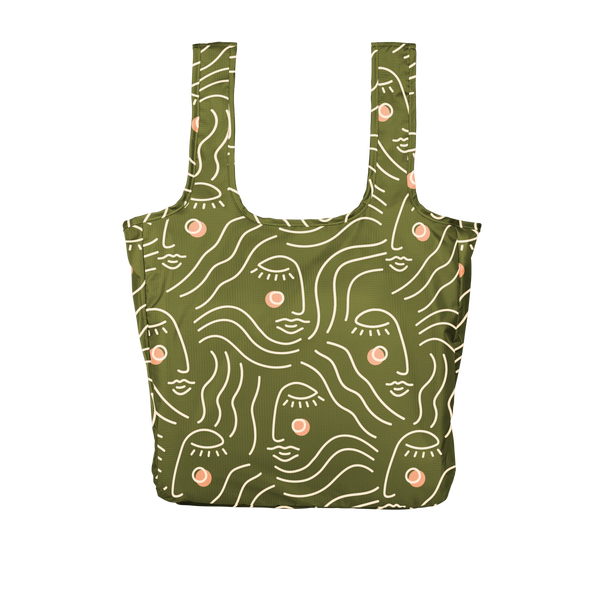 An olive green, large sized tote bag with female faces printed on in white lines that are not connected.