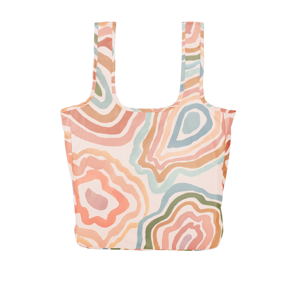 large sized tote with orange, peach, pink, blue, and live green abstract circular squiggle designs all around the whole bag.