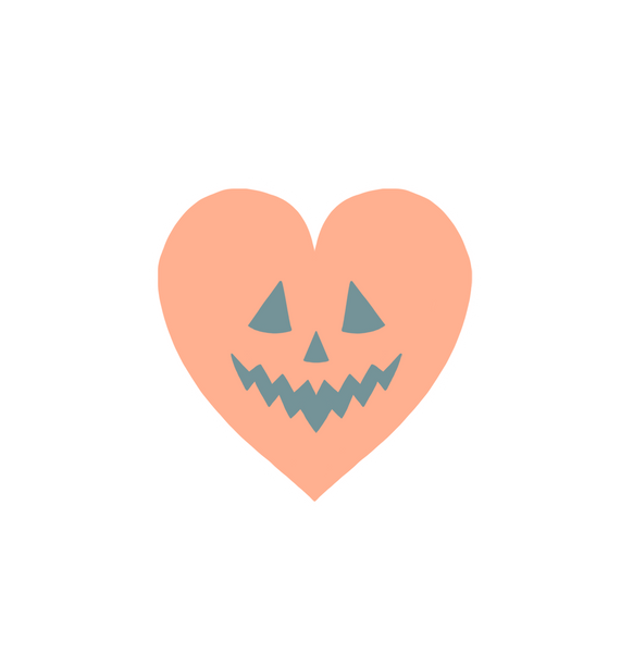 light orange heart shaped sticker with black pumpkin carved face (pumpkin heart)