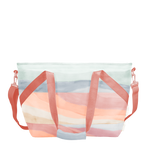 Tarp ice cooler bag in with a hill-like design in sunset colors like orange pinks, and tans, blues 