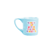 Bright blue coffee mug with colorful saying 