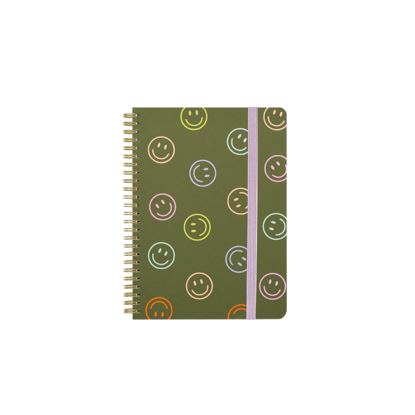 Green mini notebook with colorful smiley faces all around with purple strap