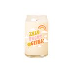 A 16 oz. candle with "Zero fucks given" design printed on.