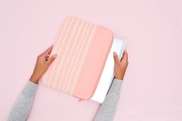 Peach Stripes Canvas Laptop Sleeve is a cute laptop sleeve in 15 inch size with a macbook inside