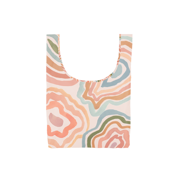 A multicolored, medium tote bag with a water stain design. Colors are pastel oranges, neutral blues and reds, along with neutral greens, creams, and browns.