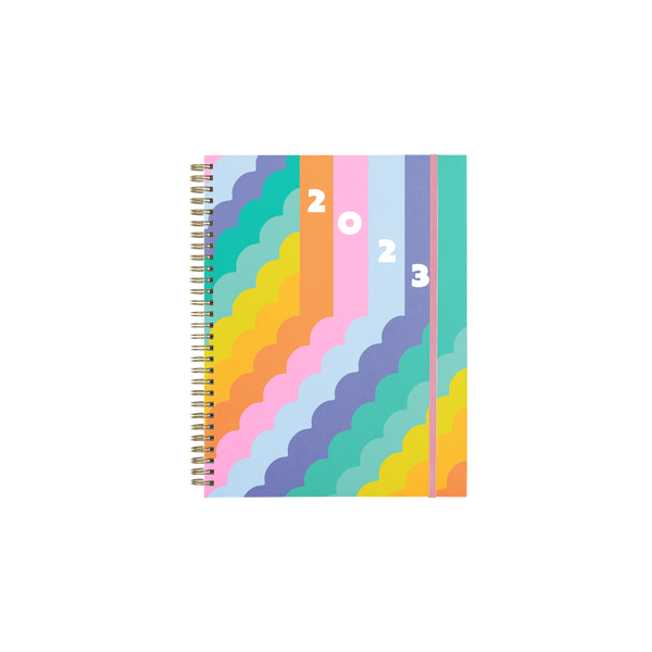 2023 planner with gold coil spiral and multicolored rainbow hardcover design
