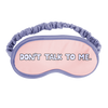 A sleep mask with periwinkle outline and strap that says don't talk to me 