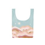 Multicolored, pastel, medium-sized tote bag with abstract hills and a sun in a starry blue-toned sky.